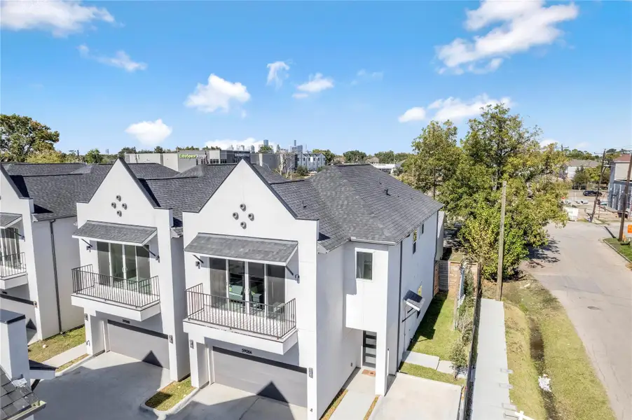 Front exterior of a new home in , Houston, TX, highlighting curb appeal (Image 26).