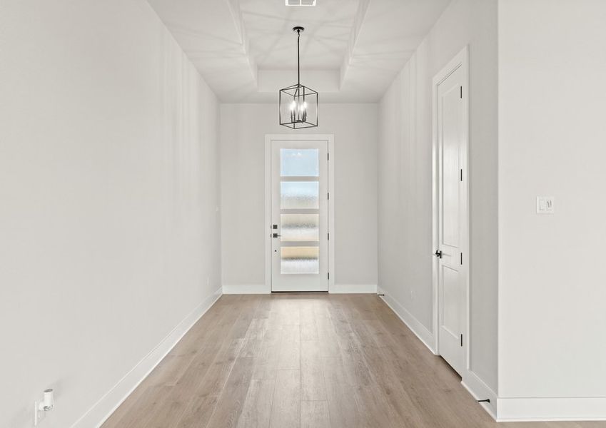 The foyer welcomes residents and guests into this beautiful home.