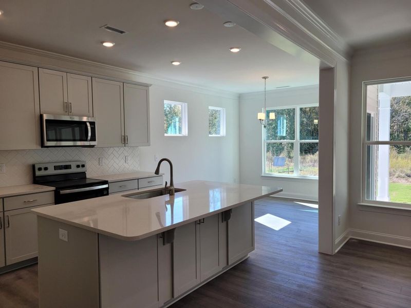 Furnished interior view inside a new home in 1158 Place, Wilson (Image 5).