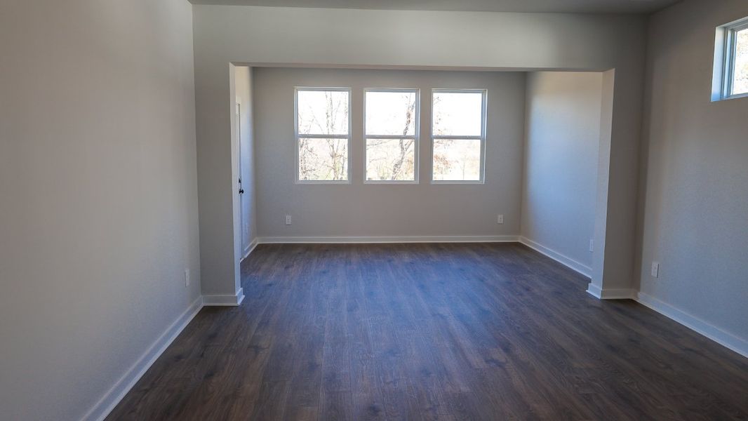 Representative unfurnished interior of a home built from the TISDALE by D.R. Horton in Harvest Point, Spring Hill (Image 27).