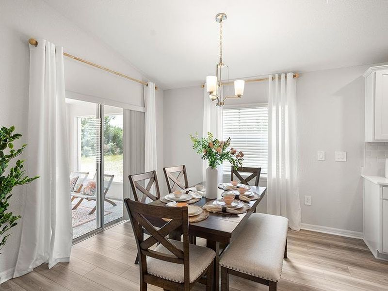 Dine at the island, or in the sunny cafe - Parker by Highland Homes