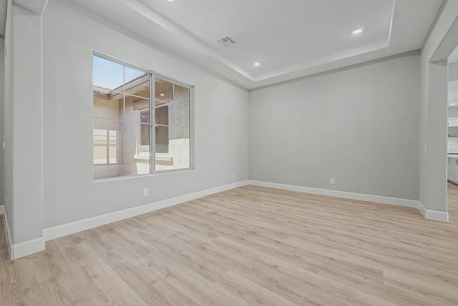 Spacious, unfurnished interior of a new home in Bellero Estates, Queen Creek (Image 19).