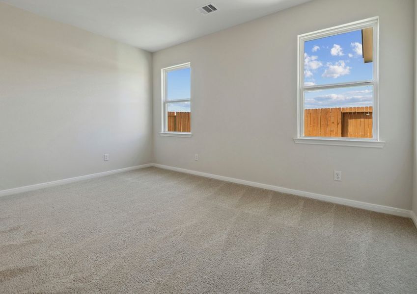 Master bedroom with two windows Master bedroom with two windows