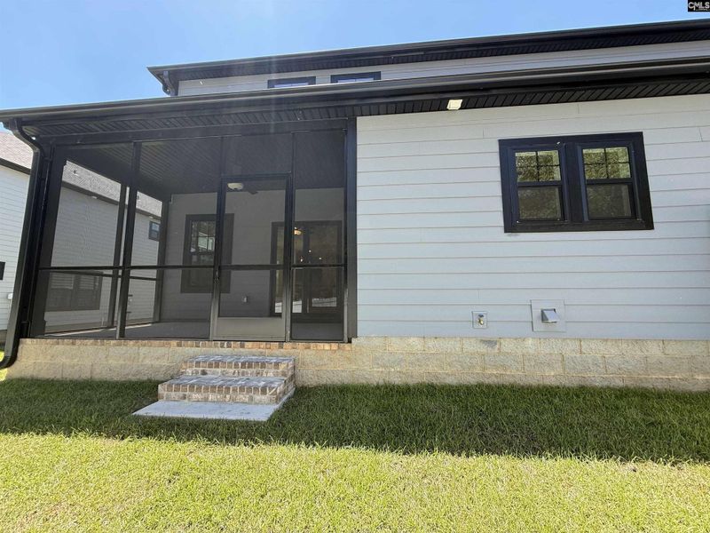 Front exterior of a new home in Dunbar Village, Cayce, SC, highlighting curb appeal (Image 2).