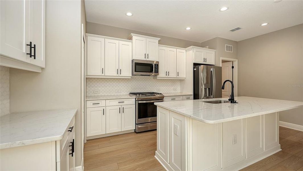 Furnished interior view inside a new home in , Englewood (Image 6). Furnished interior view inside a new home in , Englewood (Image 6).