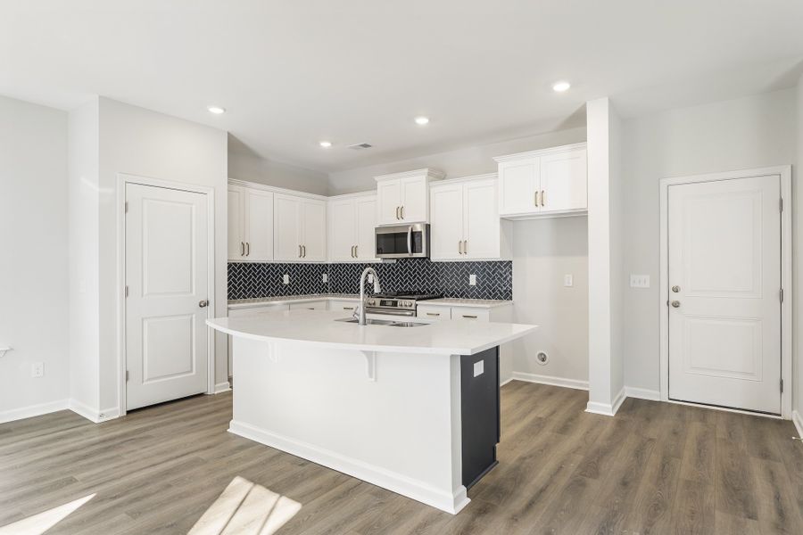 Furnished interior view inside a new home in Landing at Pine Lake, Anderson (Image 8).