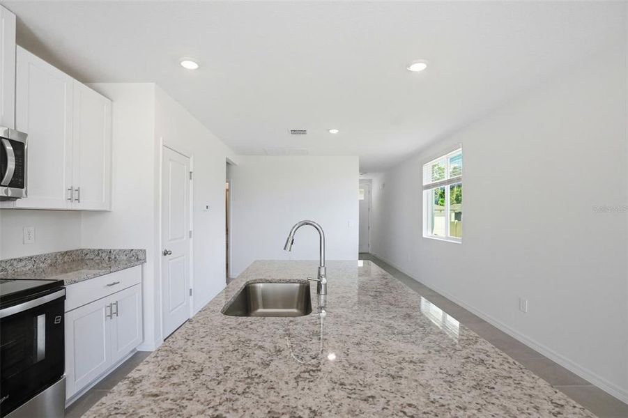 Furnished interior view inside a new home in Leyland Preserve - Premier Series, Brooksville (Image 13).