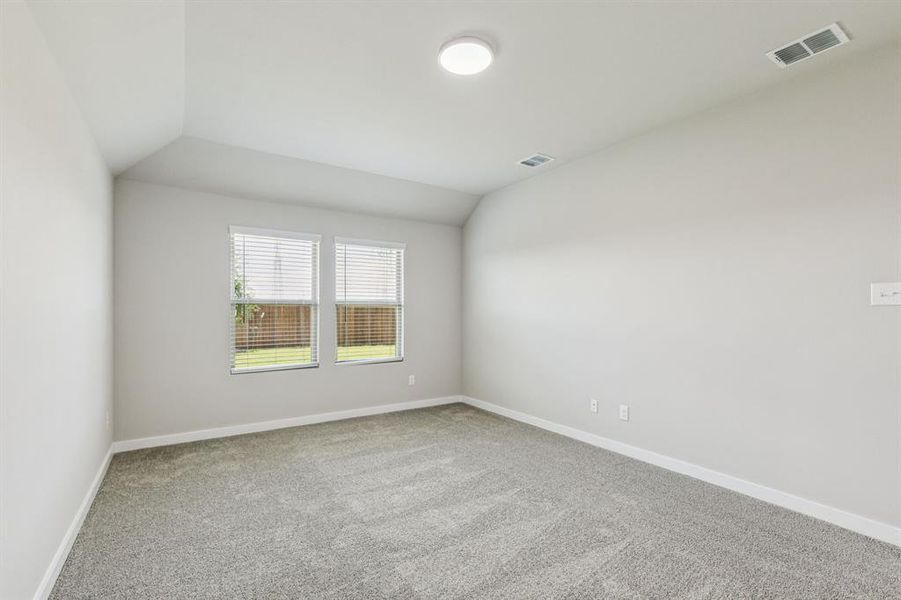 Primary Suite in the Harper home plan by Trophy Signature Homes – REPRESENTATIVE PHOTO