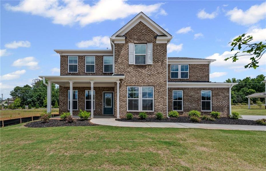 Front exterior of a new home in Anderson Point Estates, McDonough, GA, highlighting curb appeal (Image 20).