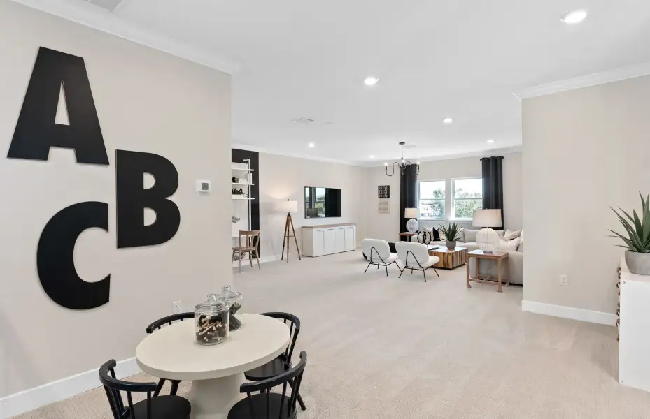 Representative furnished interior of a home built from the Ashby Grand by Pulte Homes in Stonehill, Howey-in-the-Hills (Image 8).