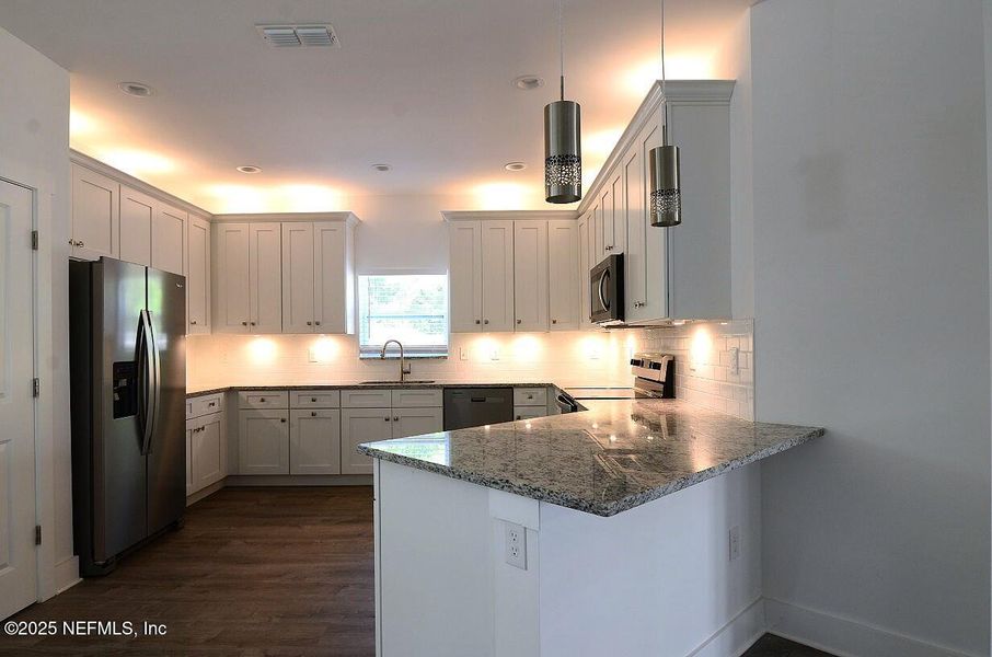 Furnished interior view inside a new home in , Jacksonville (Image 9). Furnished interior view inside a new home in , Jacksonville (Image 9).