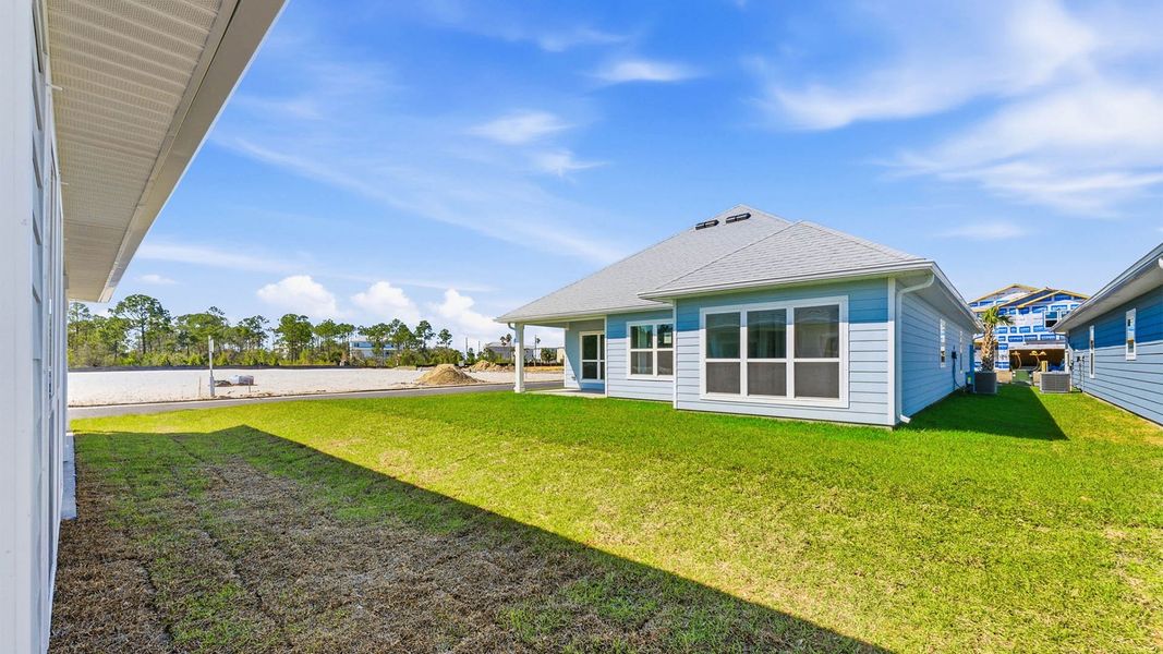 Exterior details and patio area of a home in WindMark Beach, Port Saint Joe (Image 21).