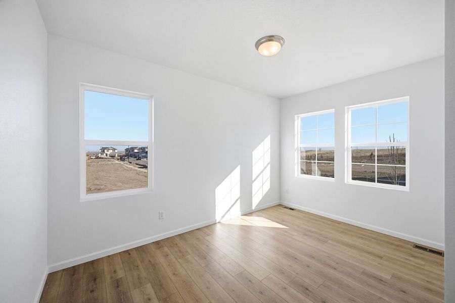 Spacious, unfurnished interior of a new home in Trailstone, Arvada (Image 14).