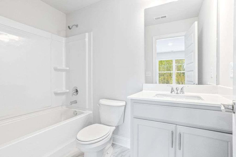 Furnished interior view inside a new home in Waters Edge, Mansfield (Image 6).