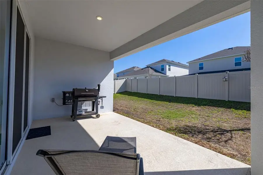 Exterior details and patio area of a home in Hartwood Landing, Clermont (Image 33).