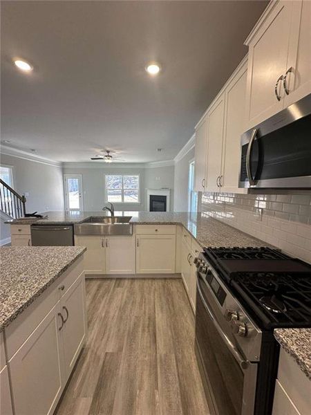 Furnished interior view inside a new home in Mirror Lake at South Harbour, Villa Rica (Image 6).