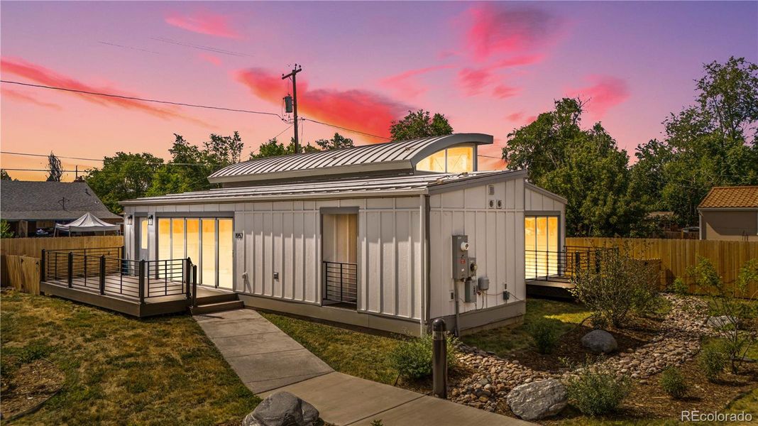 Front exterior of a new home in , Aurora, CO, highlighting curb appeal (Image 1).