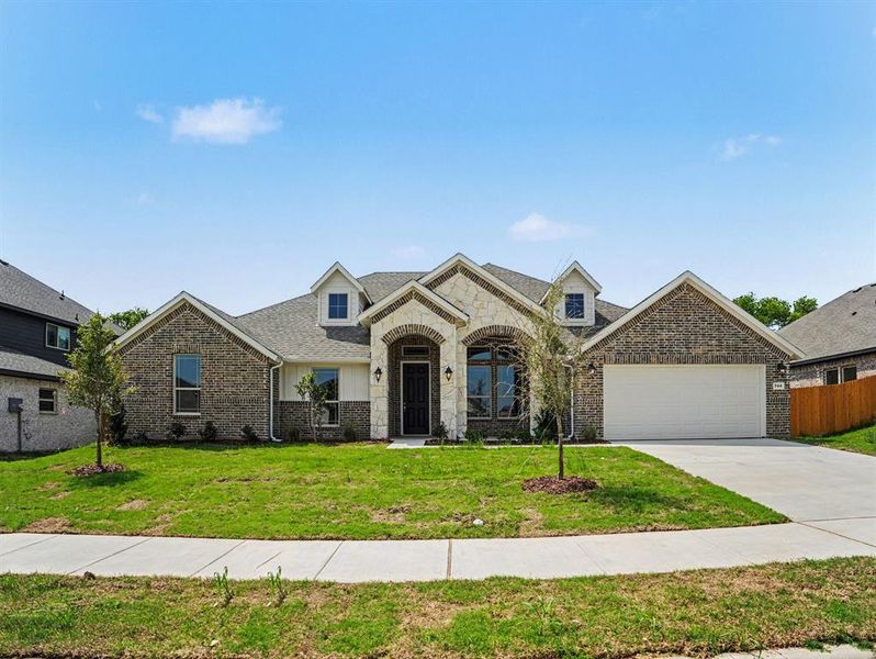 Front exterior of a new home in Cole Crossing Estates, DeSoto, TX, highlighting curb appeal (Image 19). Front exterior of a new home in Cole Crossing Estates, DeSoto, TX, highlighting curb appeal (Image 19).