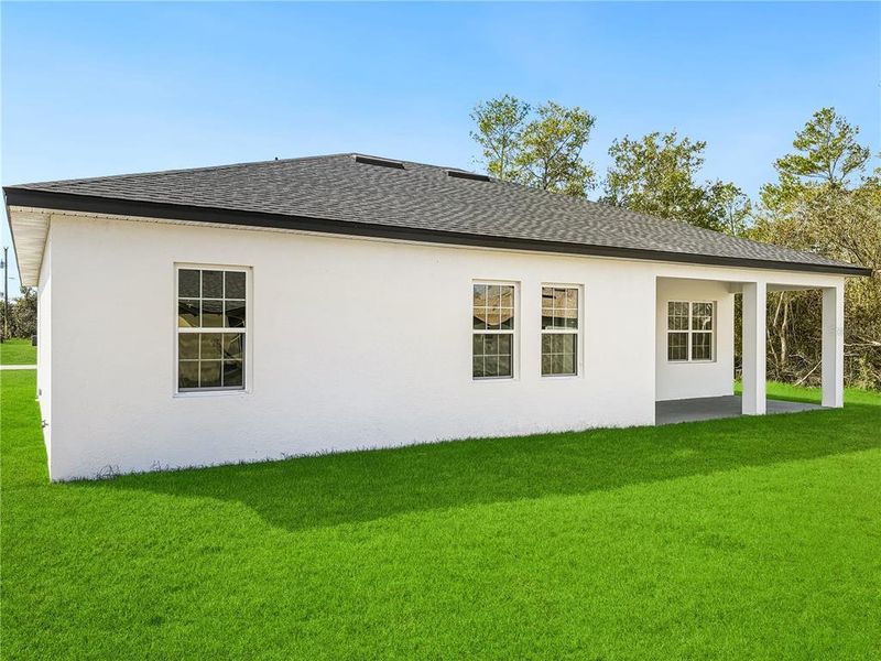 Exterior details and patio area of a home in , Ocala (Image 25).