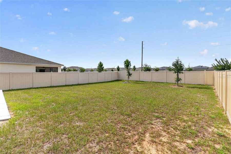 Exterior details and patio area of a home in Scenic Terrace, Haines City (Image 4).