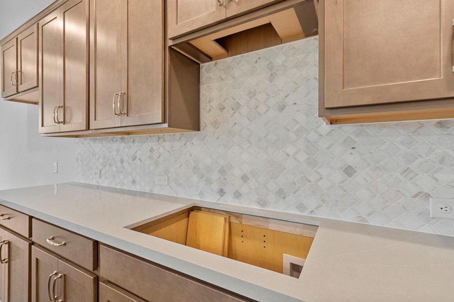 A close up detail of the classic with a twist marble backsplash.