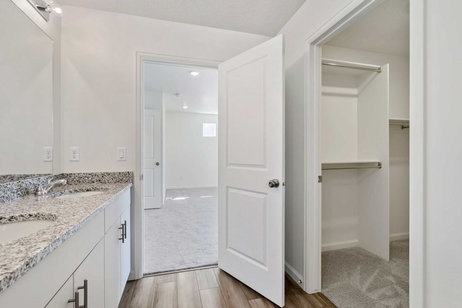 Furnished interior view inside a new home in Reunion, Commerce City (Image 10).