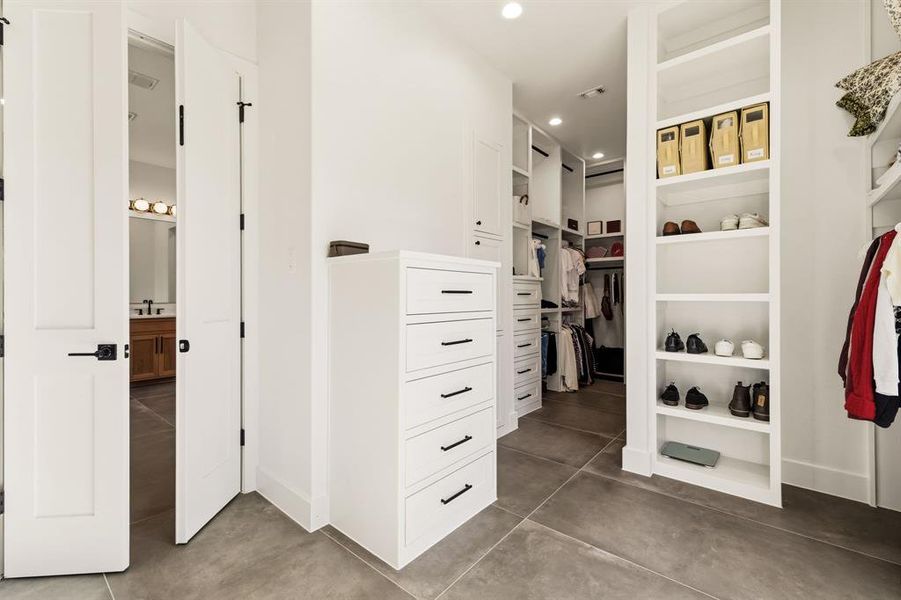 Over 22' of Primary Closet with Window for Natural Light Over 22' of Primary Closet with Window for Natural Light