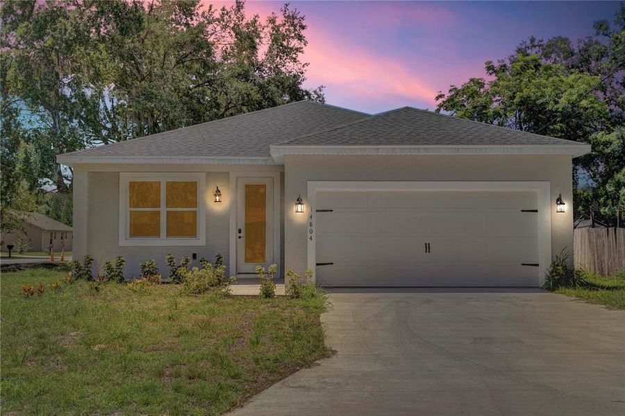 Front exterior of a new home in , Winter Garden, FL, highlighting curb appeal (Image 17).