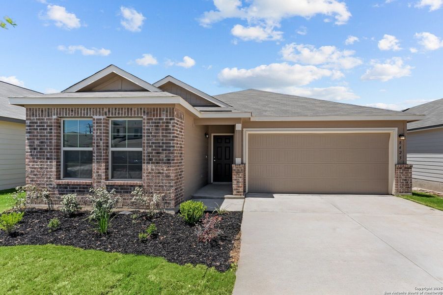 Front exterior of a new home in Hunters Ranch, San Antonio, TX, highlighting curb appeal (Image 22). Front exterior of a new home in Hunters Ranch, San Antonio, TX, highlighting curb appeal (Image 22).