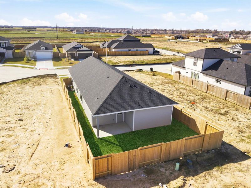 Exterior details and patio area of a home in Sweetgrass Village, Crosby (Image 29). Exterior details and patio area of a home in Sweetgrass Village, Crosby (Image 29).