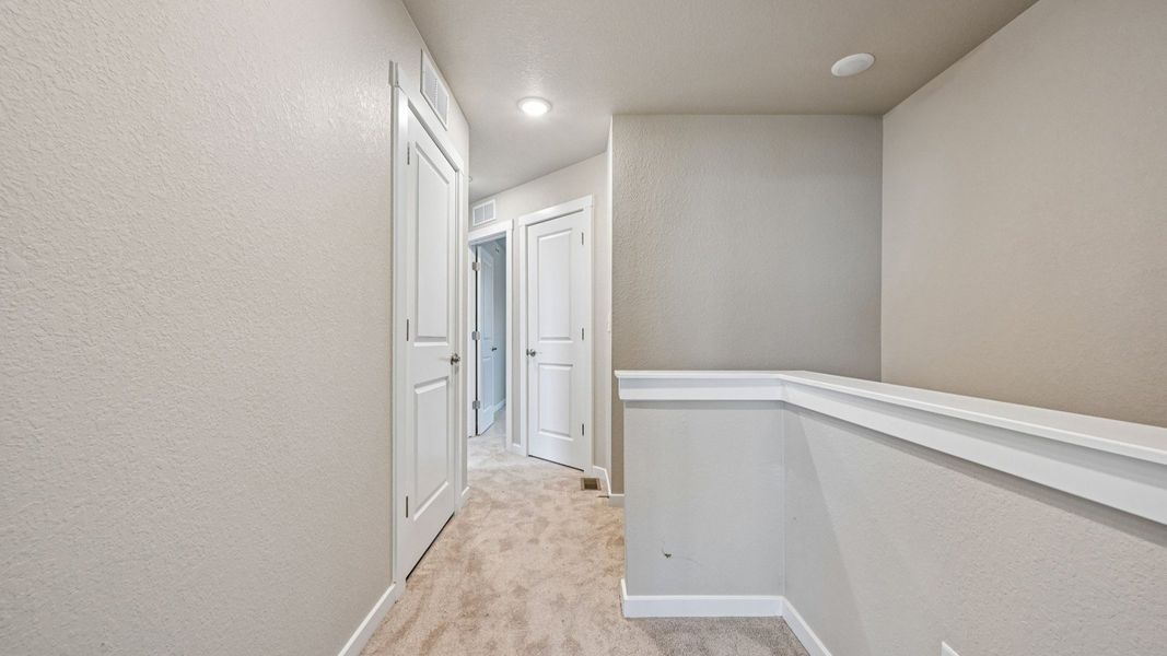 Furnished interior view inside a new home in Windler Townhomes, Aurora (Image 39).