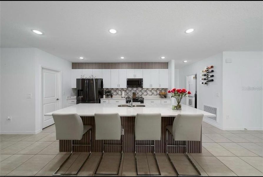 Furnished interior view inside a new home in , Kissimmee (Image 10).