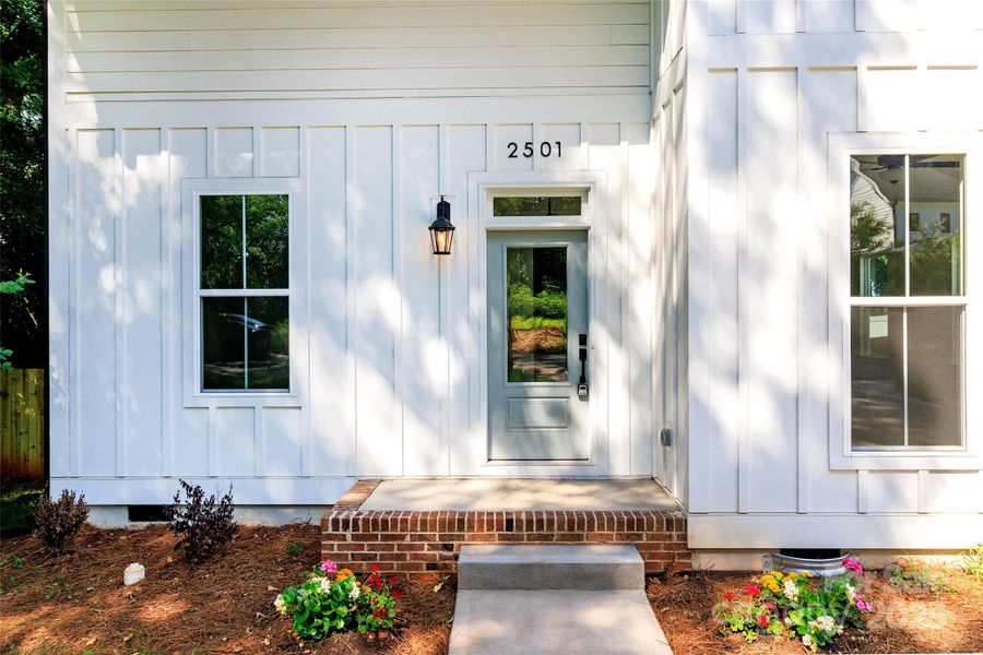 Front exterior of a new home in , Charlotte, NC, highlighting curb appeal (Image 1). Front exterior of a new home in , Charlotte, NC, highlighting curb appeal (Image 1).