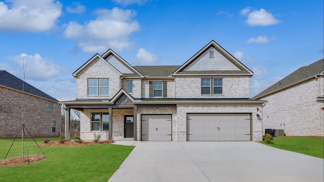 Representative exterior photo of a completed home built from the Isabella II by DRB Homes in Adagio, Dacula, GA (Image 25).
