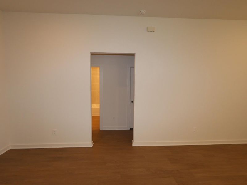 Spacious, unfurnished interior of a new home in Pinewood at Grand Texas, New Caney (Image 9).