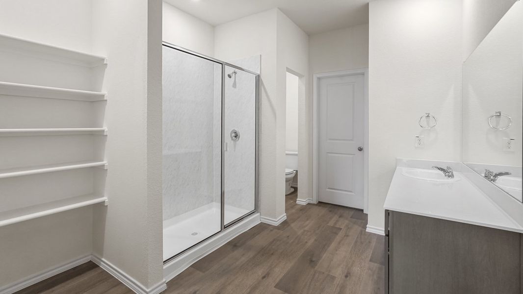 Representative furnished interior of a home built from the Jasmine by D.R. Horton in Wildwood, Royse City (Image 5).