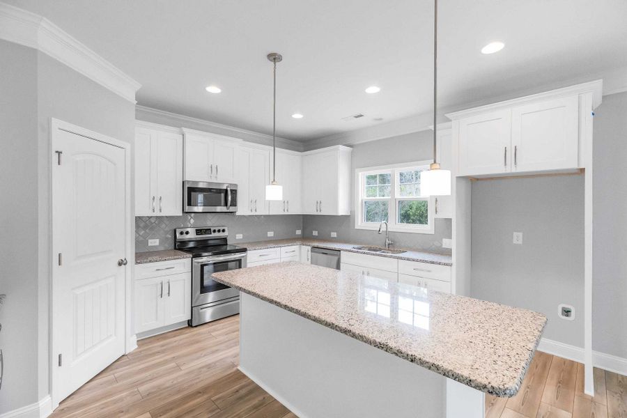 Representative furnished interior of a home built from the Drayton by Caviness & Cates Communities in Bartlett Manor, Youngsville (Image 176).