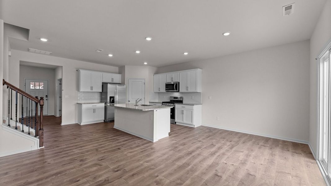 Furnished interior view inside a new home in Beaver Dam Crossing, Bailey (Image 8).