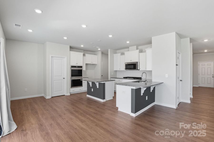 Furnished interior view inside a new home in Walnut Creek: Enclave, Lancaster (Image 3).