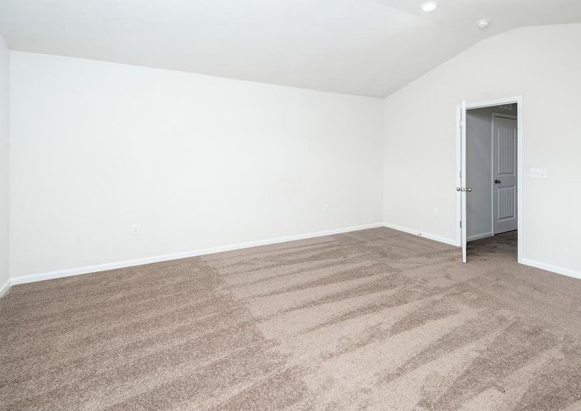 Master bedroom with carpet.