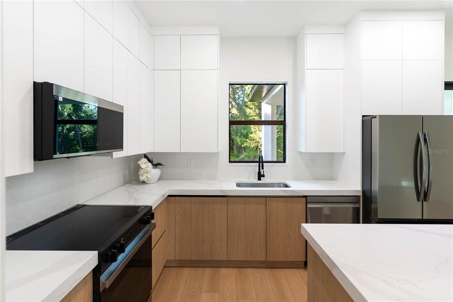 Furnished interior view inside a new home in , Port Charlotte (Image 15).