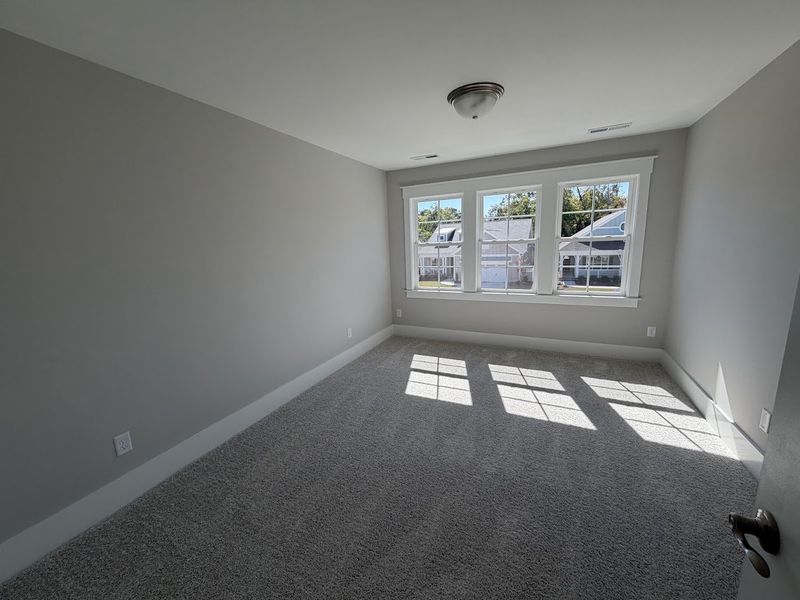 Spacious, unfurnished interior of a new home in Riverside Cove, Wilmington (Image 20).