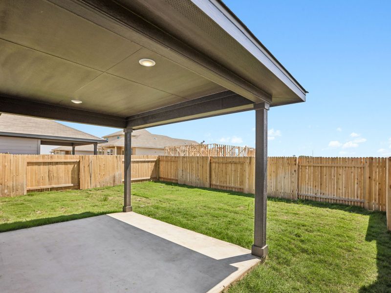 Exterior details and patio area of a home in Travena - Americana Collection, Georgetown (Image 2). Exterior details and patio area of a home in Travena - Americana Collection, Georgetown (Image 2).