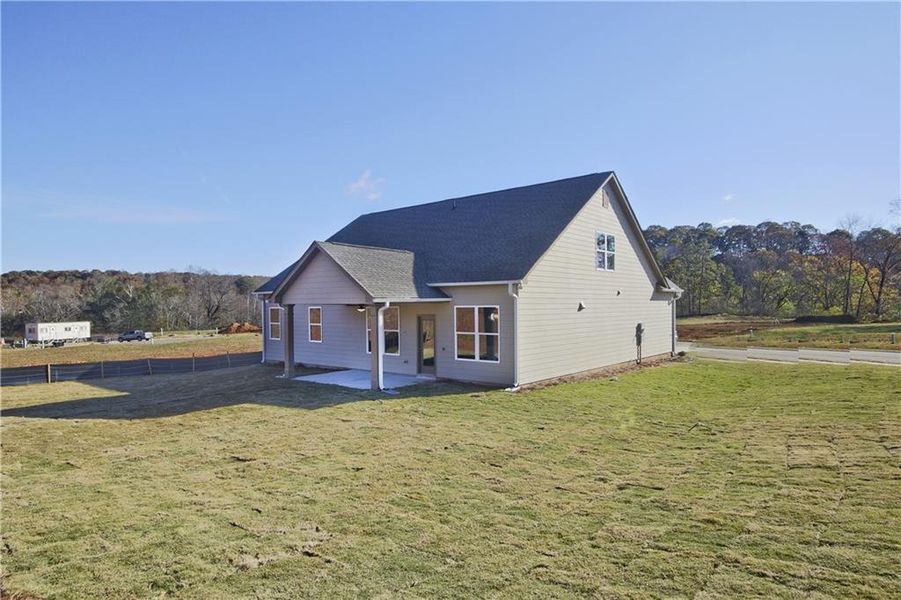 Exterior details and patio area of a home in Clark Farms, Flowery Branch (Image 23).