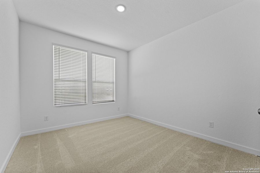 Spacious, unfurnished interior of a new home in Hidden Trails: Coastline Collection, Bulverde (Image 27).