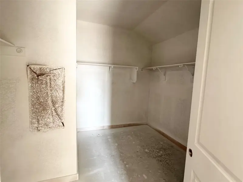 Walk in closet with vaulted ceiling Walk in closet with vaulted ceiling