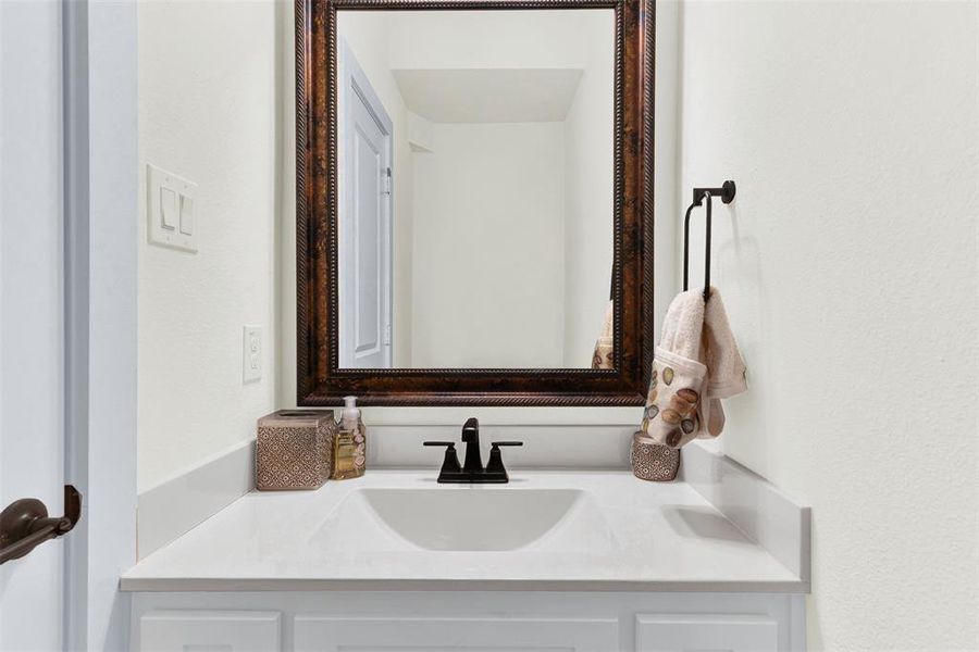 Bathroom featuring vanity Bathroom featuring vanity