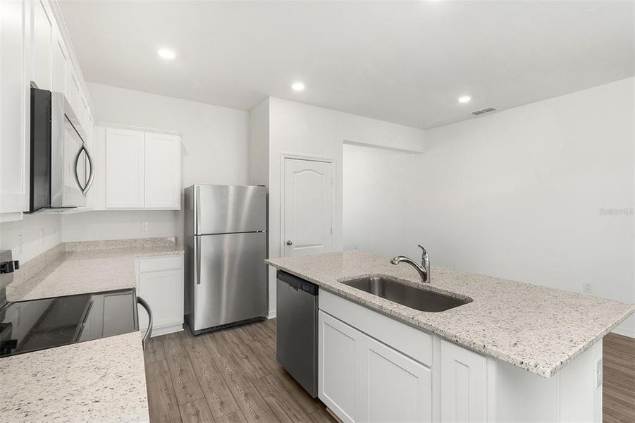 Furnished interior view inside a new home in Peach Crossings, Winter Haven (Image 8).