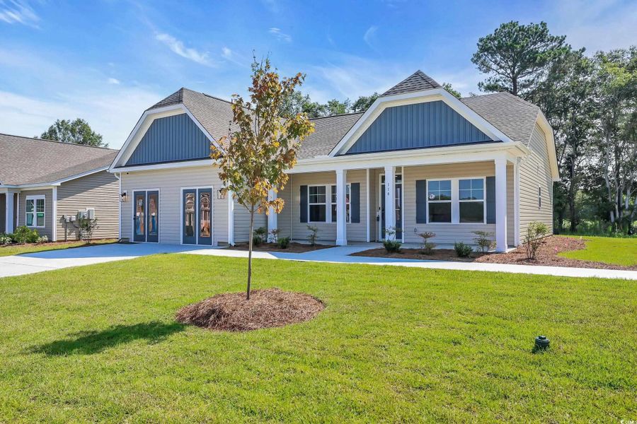 Front exterior of a new home in Westwood Reserve, Conway, SC, highlighting curb appeal (Image 2).