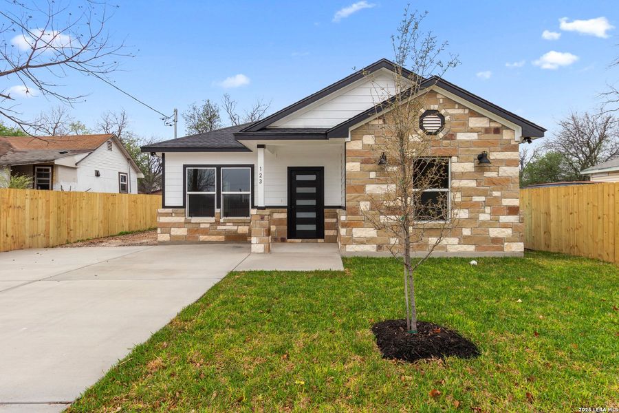 Front exterior of a new home in , San Antonio, TX, highlighting curb appeal (Image 15).